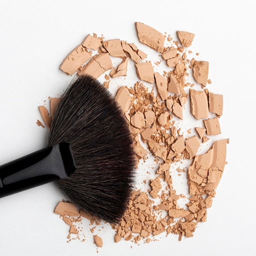 Crushed compact face powder with makeup brush 