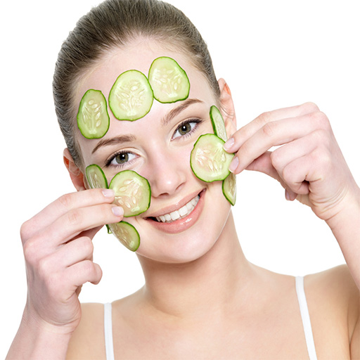 Cucumber on the face of girl